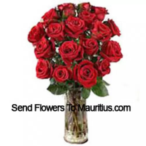 18 Red Roses With Some Ferns In A Vase